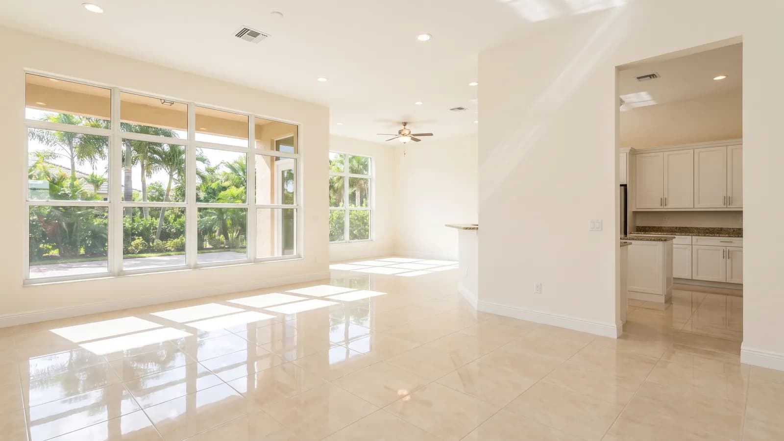 A finished, move-in-ready Florida home interior with clean floors and natural light through large windows.