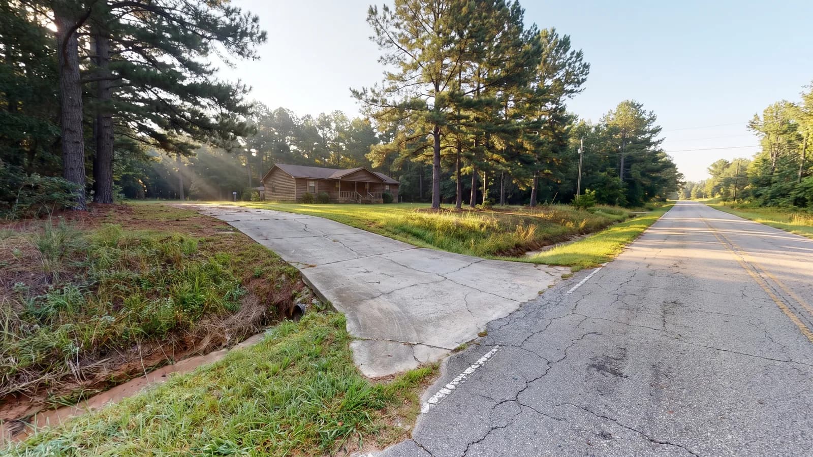 A residential driveway meeting a two lane road in North Carolina